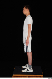  Johnny Reed dressed grey shorts sneakers sports standing white t shirt whole body 0003.jpg